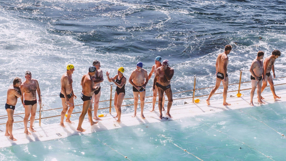 Bondi swimmers braving the cold at Bondi Icebergs, beat the chill use a after swim hoodie