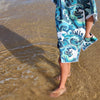 Wipeout sand free beach towels wading in a puddle at hastings point